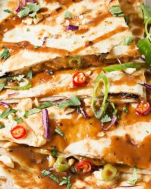 Thai Peanut Chicken Quesadillas | Thai chicken gets a fusion twist in these Thai peanut chicken quesadillas! Loaded with flavor and fun to make, try them tonight! | http://thechunkychef.com