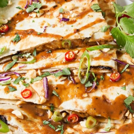 Thai Peanut Chicken Quesadillas | Thai chicken gets a fusion twist in these Thai peanut chicken quesadillas! Loaded with flavor and fun to make, try them tonight! | http://thechunkychef.com