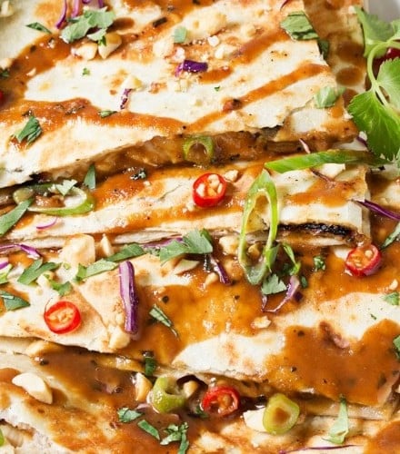 Thai Peanut Chicken Quesadillas | Thai chicken gets a fusion twist in these Thai peanut chicken quesadillas! Loaded with flavor and fun to make, try them tonight! | http://thechunkychef.com