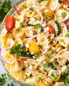 Always a crowd-pleaser, this pasta salad has won first place in several potluck contests. Summer vegetables, tender pasta, salty cheese, and a mouthwatering zesty dressing! #pastasalad #potluck #bbq #italian #greek #mediterranean #pasta, #salad #makeaheadrecipe #easyrecipe