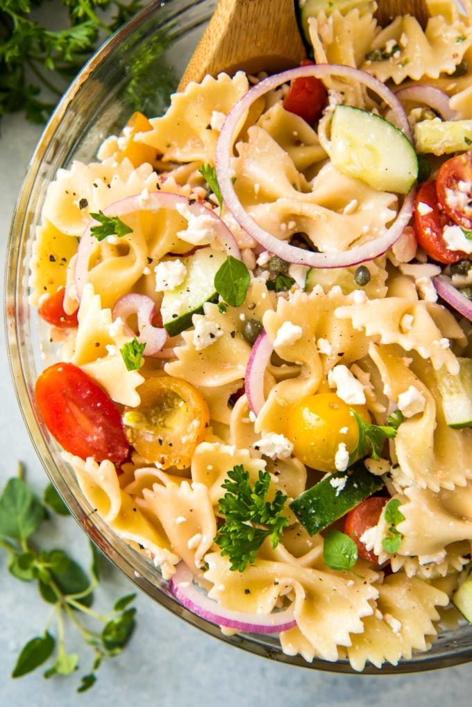 Serving pasta salad from bowl