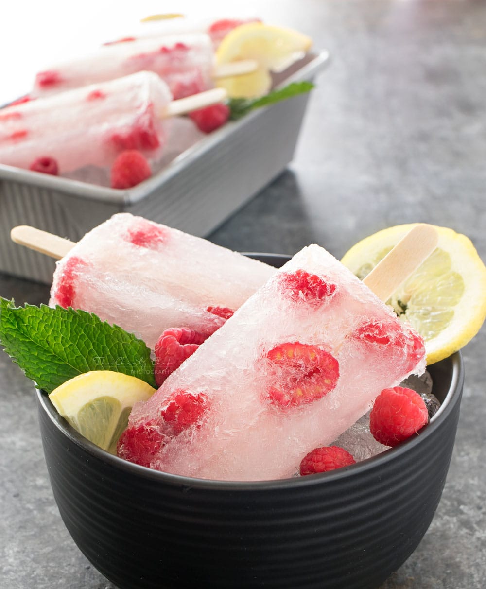 Raspberry Lemonade Popsicles | These raspberry lemonade popsicles are so easy to make! They're a refreshing way to cool down on a hot day, and loved by kids and adults!