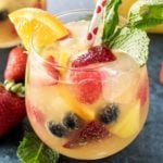 Summer Pineapple Punch | This sweet and easy to make pineapple punch will be the hit of any party! Just 4 simple ingredients plus fresh fruit and pretty garnishes! | http://thechunkychef.com