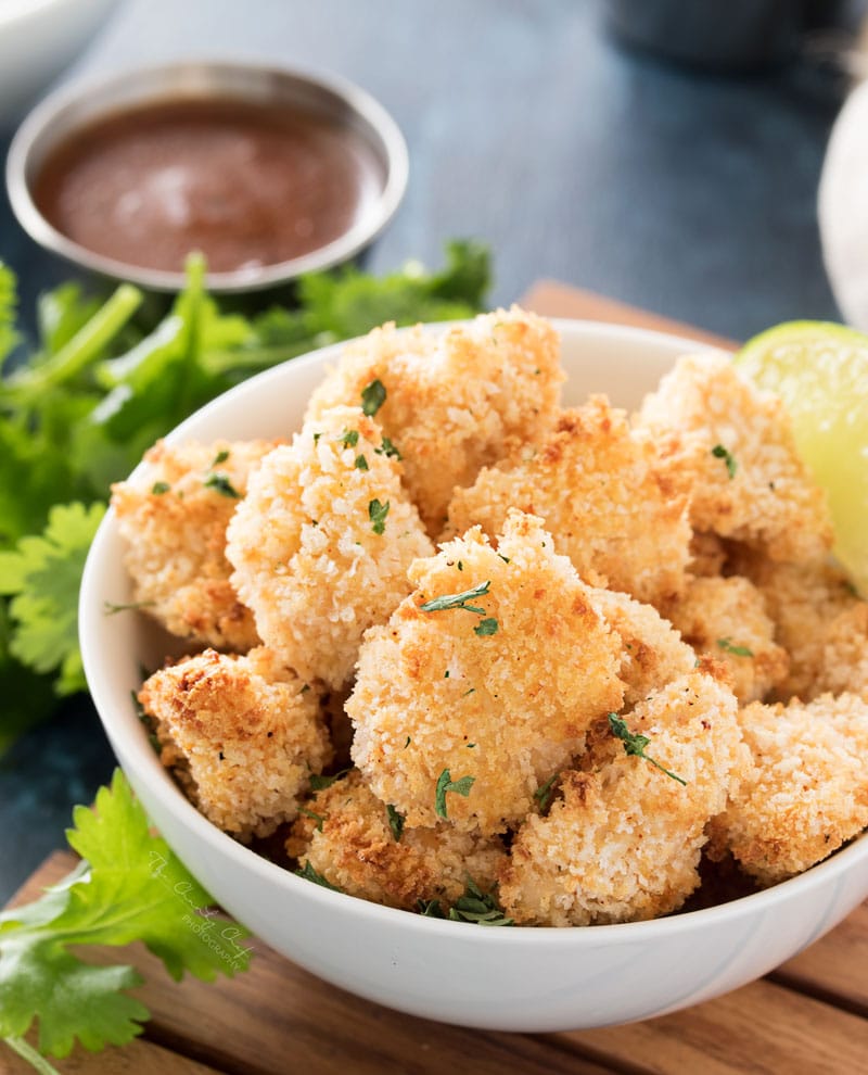 Baked Caribbean Jerk Chicken Bites | These ultra crispy chicken bites are lightened up by baking instead of frying in oil, then tossed in a mouthwatering copycat Caribbean Jerk sauce! | http://thechunkychef.com