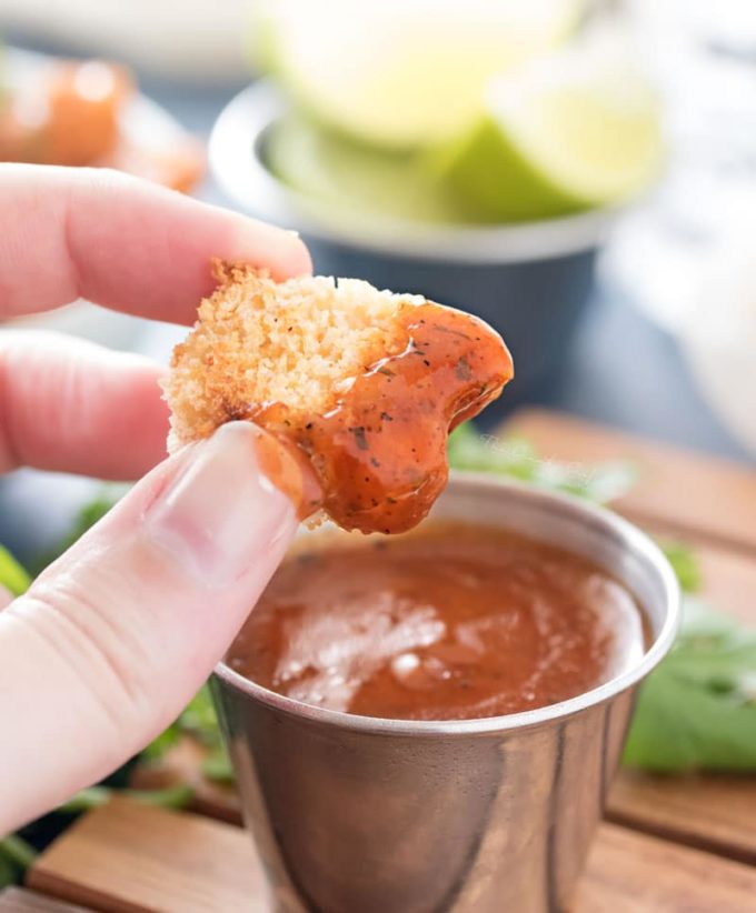 Baked Caribbean Jerk Chicken Bites | These ultra crispy chicken bites are lightened up by baking instead of frying in oil, then tossed in a mouthwatering copycat Caribbean Jerk sauce! | http://thechunkychef.com