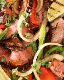 Carne Asada Steak Fajitas | Tender marinated carne asada steak, grilled until charred on the outside, and tossed with grilled peppers and onions for the most delicious steak fajitas! | http://thechunkychef.com