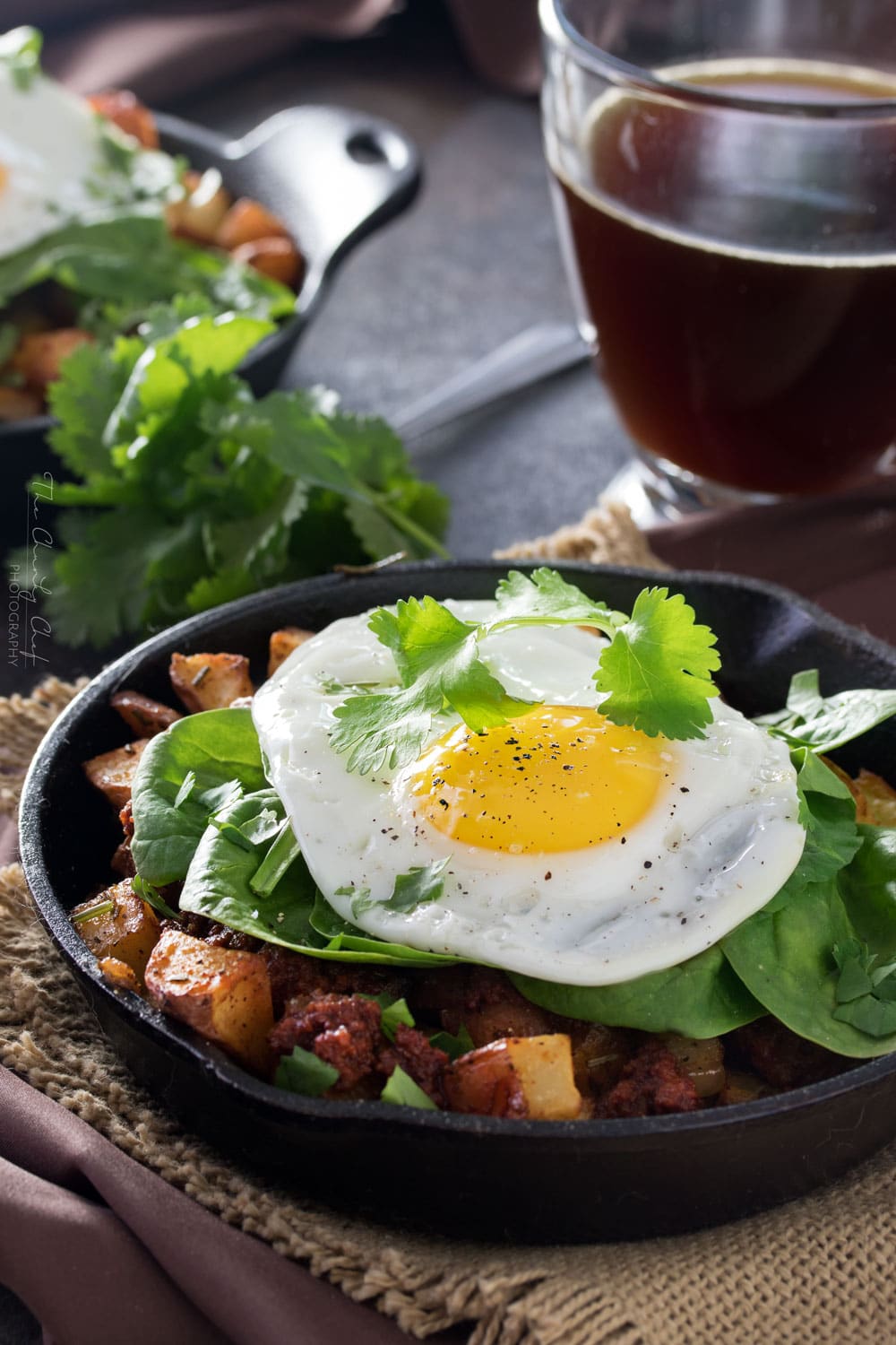 Chorizo Potato Hash with Jalapeno Aioli | Kick your breakfast up a notch with this delicious chorizo potato hash, topped with a sunny side up egg and drizzled with a homemade jalapeno aioli! |http://thechunkychef.com