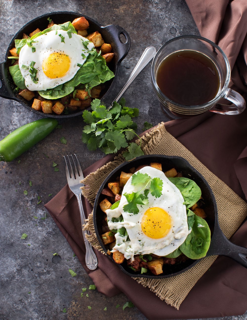 Chorizo Potato Hash with Jalapeno Aioli | Kick your breakfast up a notch with this delicious chorizo potato hash, topped with a sunny side up egg and drizzled with a homemade jalapeno aioli! |http://thechunkychef.com