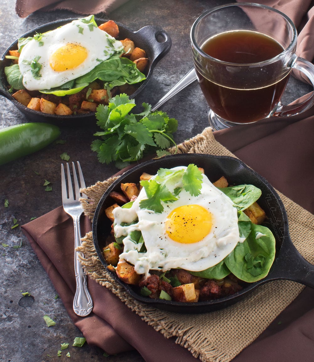 Chorizo Potato Hash with Jalapeno Aioli | Kick your breakfast up a notch with this delicious chorizo potato hash, topped with a sunny side up egg and drizzled with a homemade jalapeno aioli! |http://thechunkychef.com
