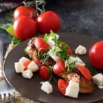 Garlic Balsamic Caprese Chicken | Juicy caprese chicken, marinated in a garlic balsamic marinade, is baked to perfection with burst cherry tomatoes, melted mozzarella cheese, fresh basil! | http://thechunkychef.com