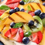 Grilled Fruit Pizza | Flatbread spread with a glorious honey herb whipped ricotta, topped with delicious grilled fruit, drizzled with honey and sprinkled with fresh herbs! | http://thechunkychef.com