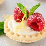 Mini No Bake White Chocolate Lemon Cheesecake Tarts | Creamy no bake white chocolate lemon cheesecake tarts, topped with your favorite fresh fruit, mint, and a dusting of powdered sugar. Impressive and easy! | http://thechunkychef.com