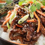 30 Minute Spicy Ginger Szechuan Beef | No need to order take-out, this spicy ginger Szechuan beef is completely mouthwatering and ready in just 30 minutes! Perfect for a busy weeknight dinner! | http://thechunkychef.com