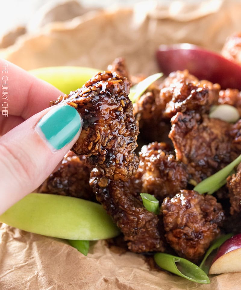 Bourbon Cider Boneless Wings | The ultimate boneless wings, marinated in buttermilk, fried until crispy, and tossed in a mouthwatering spicy bourbon apple cider sauce! | http://thechunkychef.com