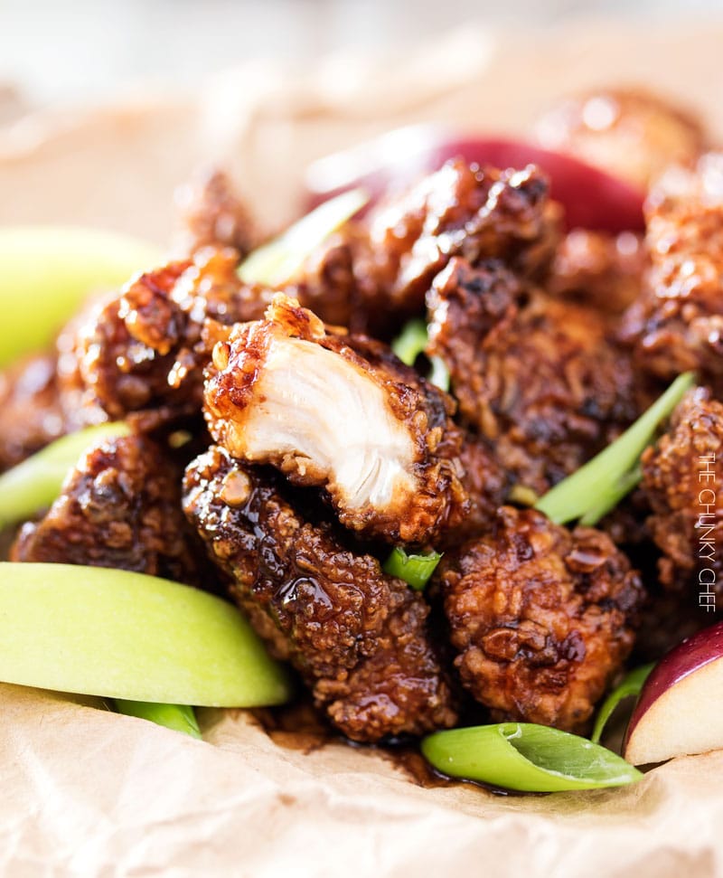 Bourbon Cider Boneless Wings | The ultimate boneless wings, marinated in buttermilk, fried until crispy, and tossed in a mouthwatering spicy bourbon apple cider sauce! | http://thechunkychef.com