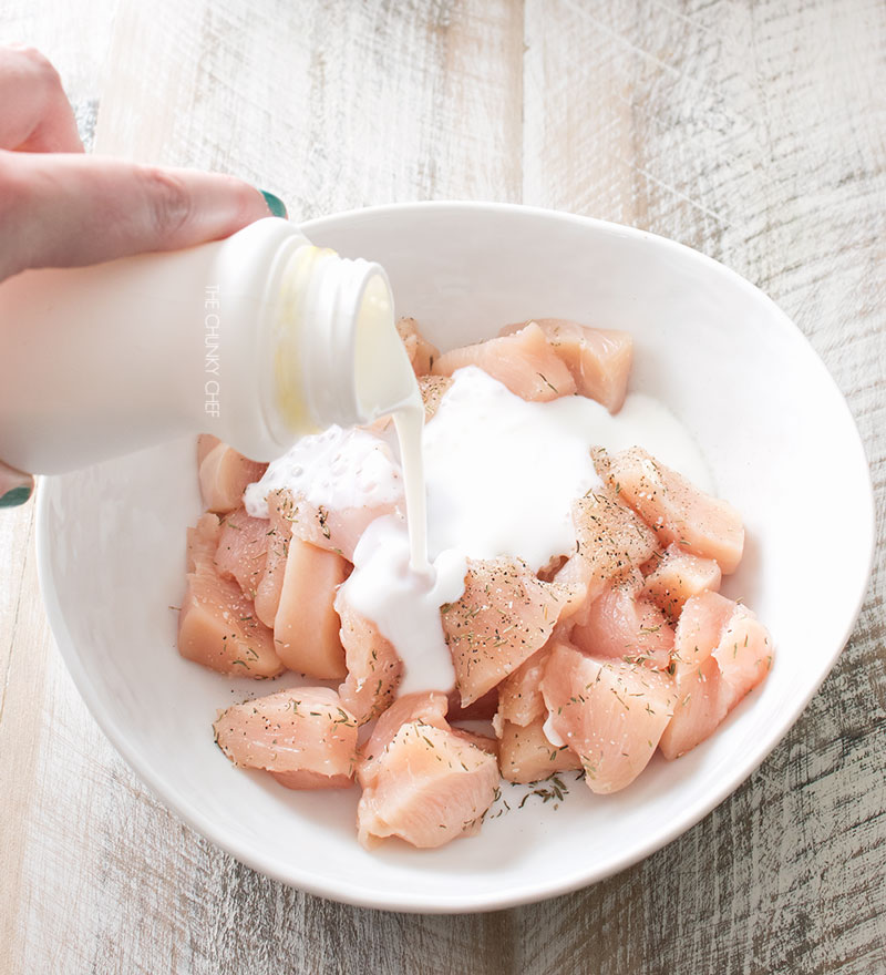 Bourbon Cider Boneless Wings | The ultimate boneless wings, marinated in buttermilk, fried until crispy, and tossed in a mouthwatering spicy bourbon apple cider sauce! | http://thechunkychef.com