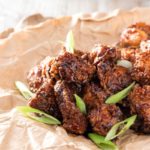 Bourbon Cider Boneless Wings | The ultimate boneless wings, marinated in buttermilk, fried until crispy, and tossed in a mouthwatering spicy bourbon apple cider sauce! | http://thechunkychef.com