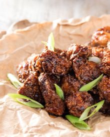 Bourbon Cider Boneless Wings | The ultimate boneless wings, marinated in buttermilk, fried until crispy, and tossed in a mouthwatering spicy bourbon apple cider sauce! | http://thechunkychef.com