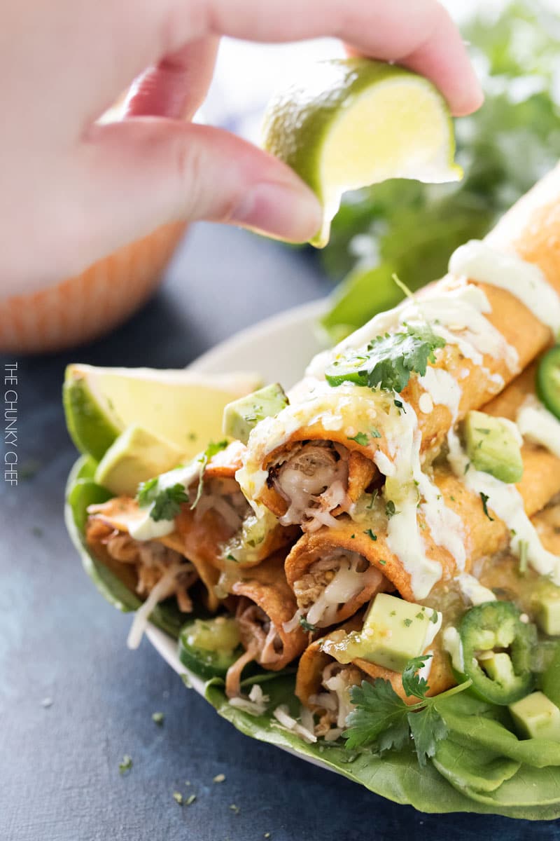 Slow Cooker Salsa Verde Pork Taquitos | The pork for these taquitos is simmered in a homemade salsa verde, shredded, piled high with cheese, wrapped up in tender corn tortillas and fried! | http://thechunkychef.com