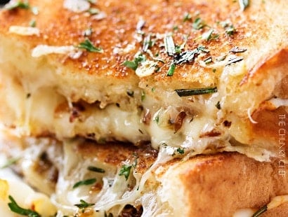 Ultimate Grilled Cheese | Gooey Gruyere and white cheddar cheese, savory rosemary butter, and herbed caramelized onions... need I say more? | http://thechunkychef.com