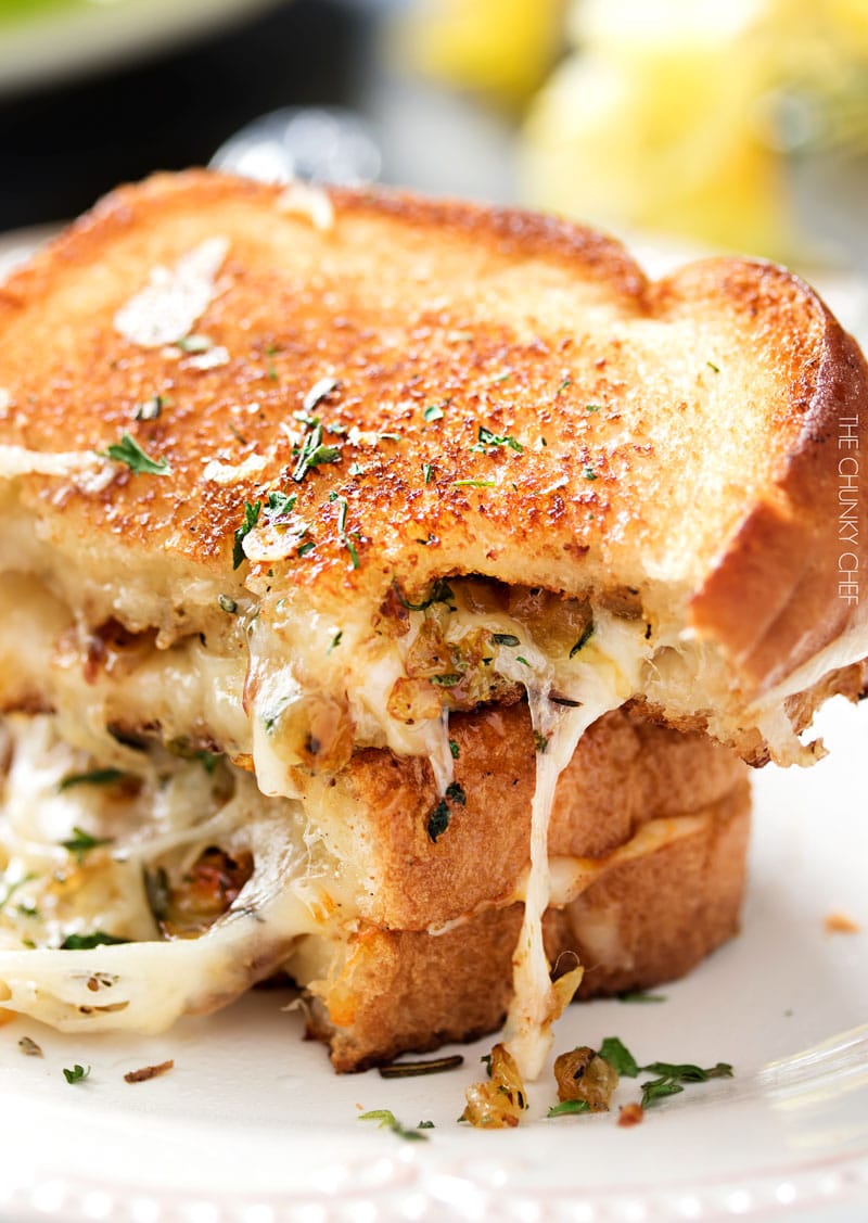 Ultimate Grilled Cheese | Gooey Gruyere and white cheddar cheese, savory rosemary butter, and herbed caramelized onions... need I say more? | http://thechunkychef.com