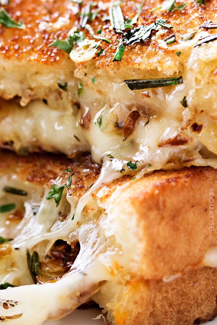 Ultimate Grilled Cheese | Gooey Gruyere and white cheddar cheese, savory rosemary butter, and herbed caramelized onions... need I say more? | http://thechunkychef.com