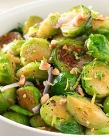 Brussels sprouts with Toasted Hazelnut Butter | Braised brussels sprouts and shallots are tossed with a savory toasted hazelnut and herb butter and ready to hit your table in less than 30 minutes! | http://thechunkychef.com