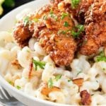 Applebee's 4 Cheese Mac and Cheese with Honey Pepper Chicken | Even better than the restaurant version, this creamy 4 cheese mac and cheese is topped with a sweet and sticky honey pepper chicken | http://thechunkychef.com