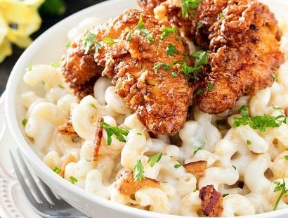 Applebee's 4 Cheese Mac and Cheese with Honey Pepper Chicken | Even better than the restaurant version, this creamy 4 cheese mac and cheese is topped with a sweet and sticky honey pepper chicken | http://thechunkychef.com