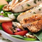 Grilled Chicken Strawberry Spinach Salad | This strawberry spinach salad is full of walnuts, fruits, cheeses, topped with juicy grilled chicken and a homemade honey herb vinaigrette! | http://thechunkychef.com