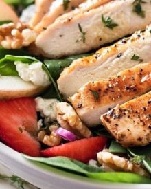 Grilled Chicken Strawberry Spinach Salad | This strawberry spinach salad is full of walnuts, fruits, cheeses, topped with juicy grilled chicken and a homemade honey herb vinaigrette! | http://thechunkychef.com