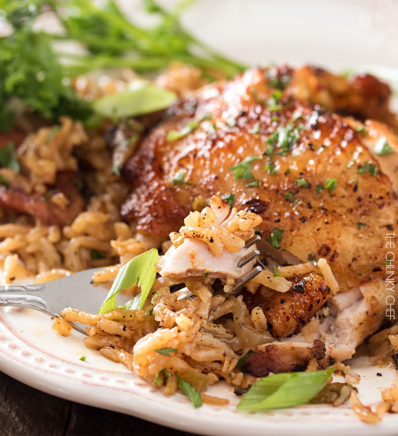 One Pot Chicken and Dirty Rice | Chicken thighs are cooked on top of a homemade dirty rice, which makes for the most flavorful Cajun-inspired dish you've ever had! Plus, all you need is one pot! | http://thechunkychef.com