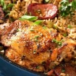One Pot Chicken and Dirty Rice | Chicken thighs are cooked on top of a homemade dirty rice, which makes for the most flavorful Cajun-inspired dish you've ever had! Plus, all you need is one pot! | http://thechunkychef.com