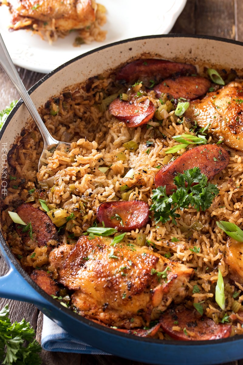 One Pot Chicken and Dirty Rice | Chicken thighs are cooked on top of a homemade dirty rice, which makes for the most flavorful Cajun-inspired dish you've ever had! Plus, all you need is one pot! | http://thechunkychef.com