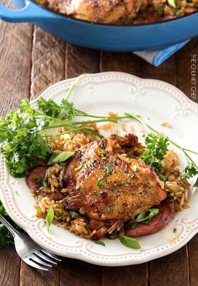 One Pot Chicken and Dirty Rice | Chicken thighs are cooked on top of a homemade dirty rice, which makes for the most flavorful Cajun-inspired dish you've ever had! Plus, all you need is one pot! | http://thechunkychef.com