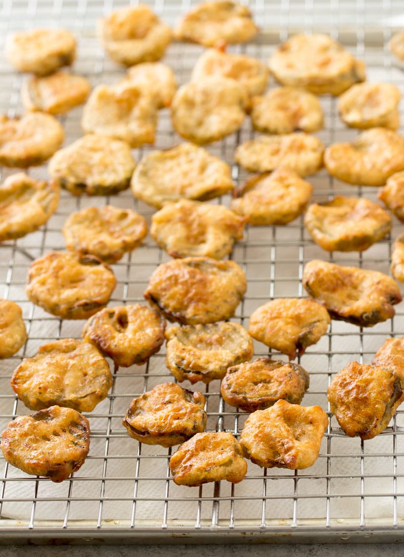 Cajun Fried Pickles with Garlic Blue Cheese Dip | Dill pickles are soaked in a Cajun buttermilk batter, fried until crispy, then dipped in a mouthwatering garlic blue cheese dipping sauce! | http://thechunkychef.com