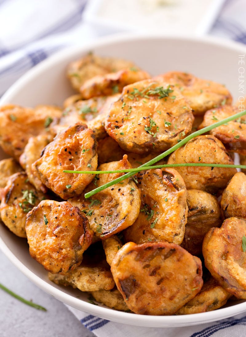 Cajun Fried Pickles with Garlic Blue Cheese Dip | Dill pickles are soaked in a Cajun buttermilk batter, fried until crispy, then dipped in a mouthwatering garlic blue cheese dipping sauce! | http://thechunkychef.com