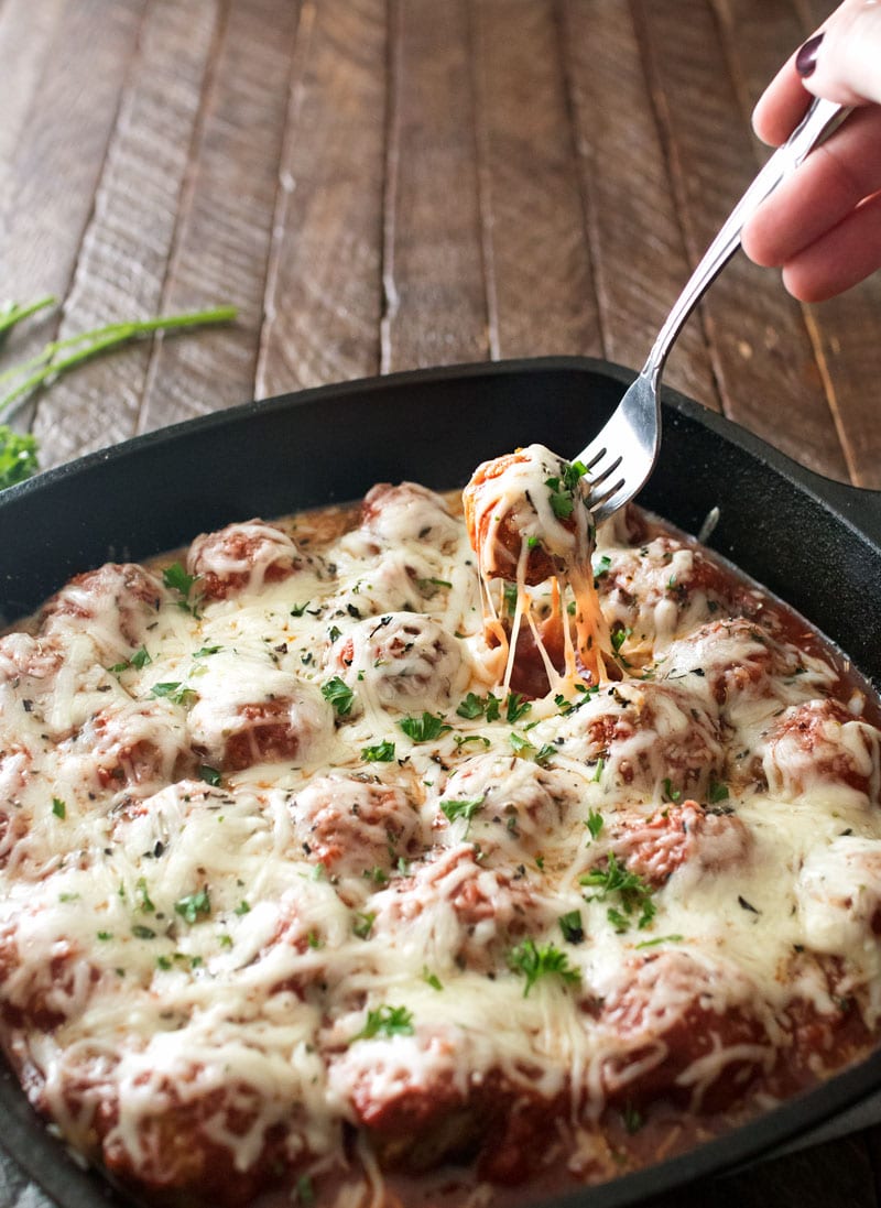 Meatball Parmesan Bake | Melt in your mouth homemade meatballs coated in marinara sauce, topped with Italian cheeses and baked to bubbly perfection! | http://thechunkychef.com