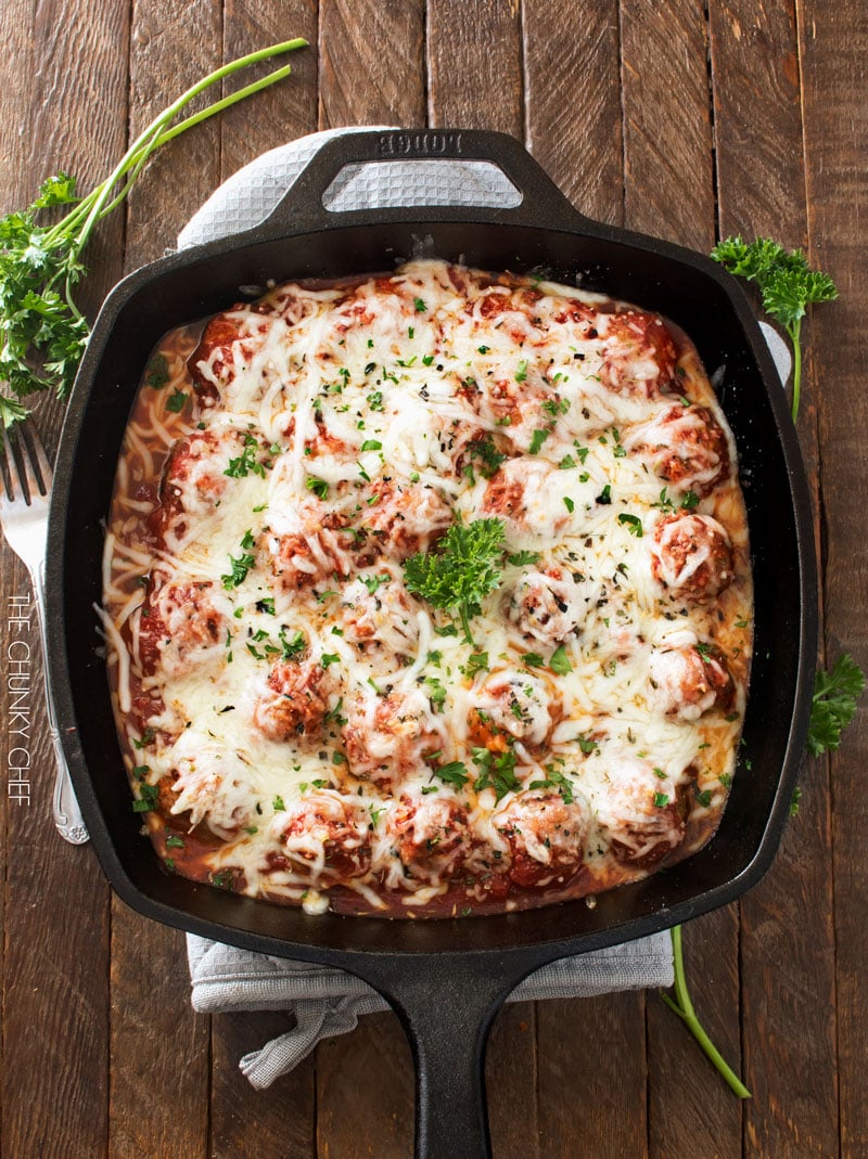 Meatball Parmesan Bake | Melt in your mouth homemade meatballs coated in marinara sauce, topped with Italian cheeses and baked to bubbly perfection! | http://thechunkychef.com