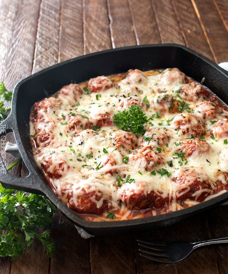 Meatball Parmesan Bake | Melt in your mouth homemade meatballs coated in marinara sauce, topped with Italian cheeses and baked to bubbly perfection! | http://thechunkychef.com