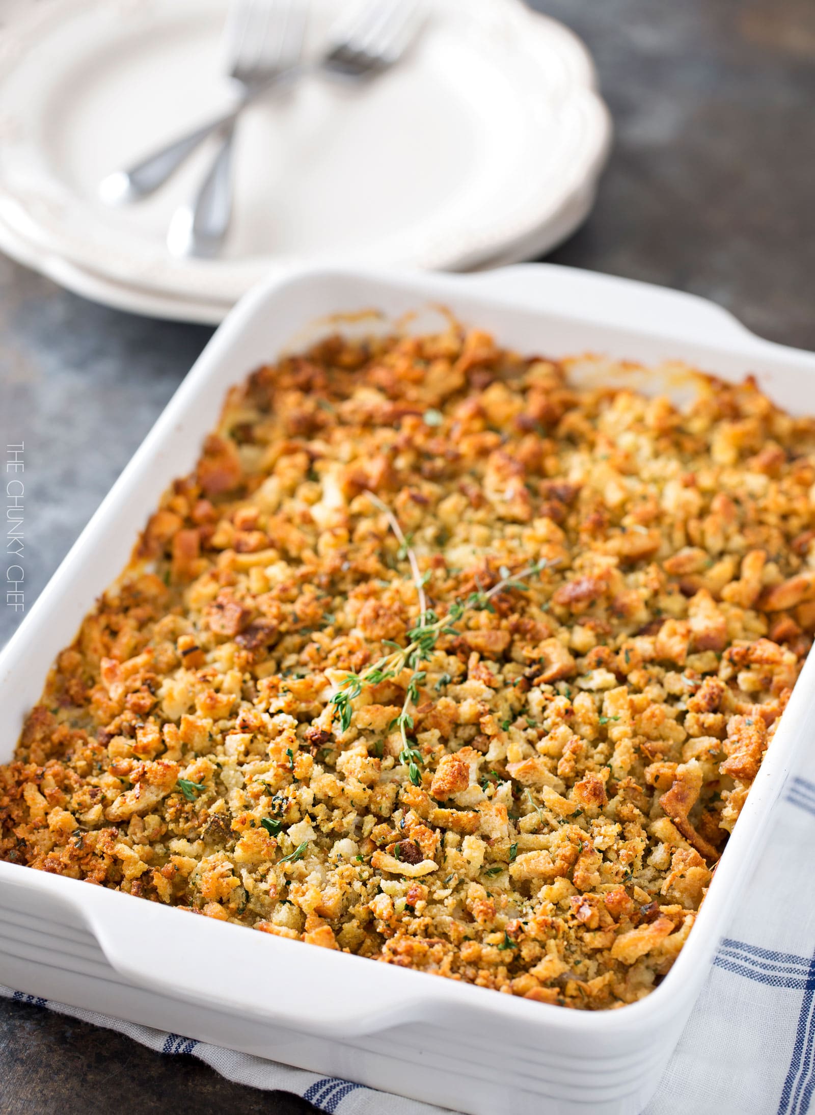 Chicken Cordon Bleu Casserole | A one pan family style casserole full of chicken, ham, swiss cheese, creamy herb sauce and savory stuffing! | http://thechunkychef.com