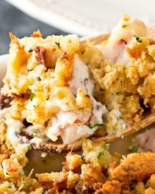 Chicken Cordon Bleu Casserole | A one pan family style casserole full of chicken, ham, swiss cheese, creamy herb sauce and savory stuffing! | http://thechunkychef.com