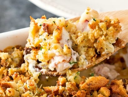 Chicken Cordon Bleu Casserole | A one pan family style casserole full of chicken, ham, swiss cheese, creamy herb sauce and savory stuffing! | http://thechunkychef.com