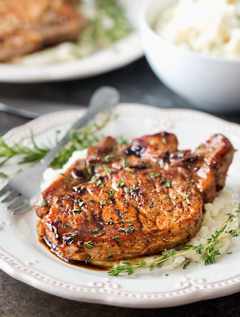 Maple Balsamic Glazed Pork Chops | Tender, juicy, bone-in glazed pork chops are seared and coated in a lip-smacking maple balsamic vinegar sauce! | http://thechunkychef.com