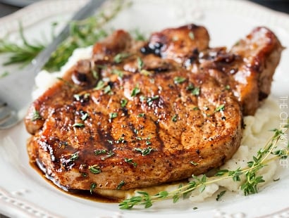 Maple Balsamic Glazed Pork Chops | Tender, juicy, bone-in glazed pork chops are seared and coated in a lip-smacking maple balsamic vinegar sauce! | http://thechunkychef.com