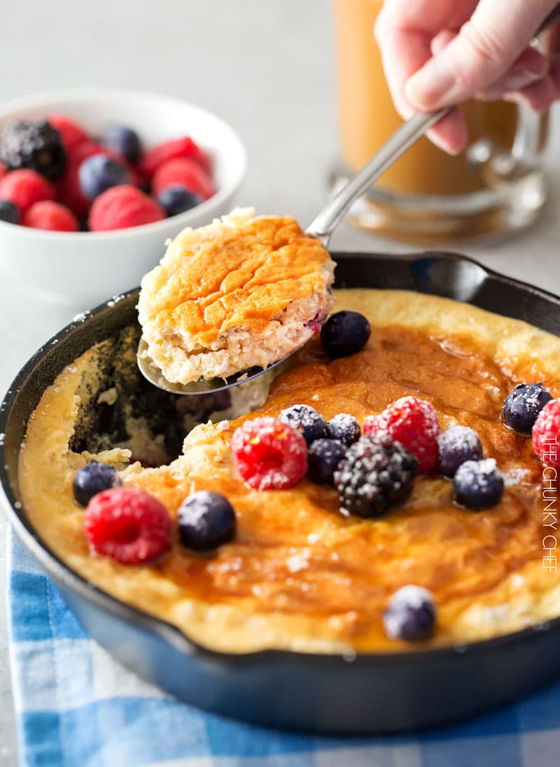 Mixed Berry Baked Oatmeal Souffle | Soft, fluffy oatmeal is folded with whipped egg whites and swirled with mixed berries, then baked until puffed and golden! | http://thechunkychef.com