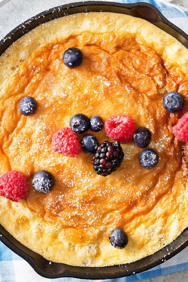 Mixed Berry Baked Oatmeal Souffle | Soft, fluffy oatmeal is folded with whipped egg whites and swirled with mixed berries, then baked until puffed and golden! | http://thechunkychef.com