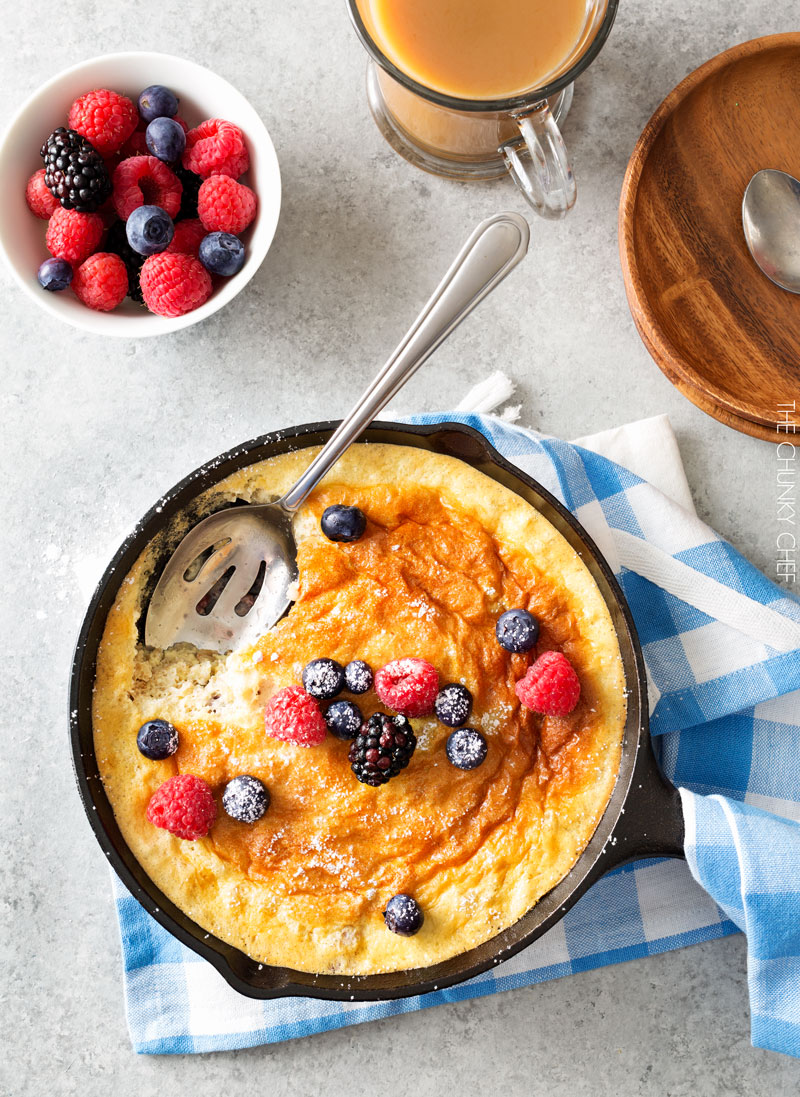 Mixed Berry Baked Oatmeal Souffle | Soft, fluffy oatmeal is folded with whipped egg whites and swirled with mixed berries, then baked until puffed and golden! | http://thechunkychef.com