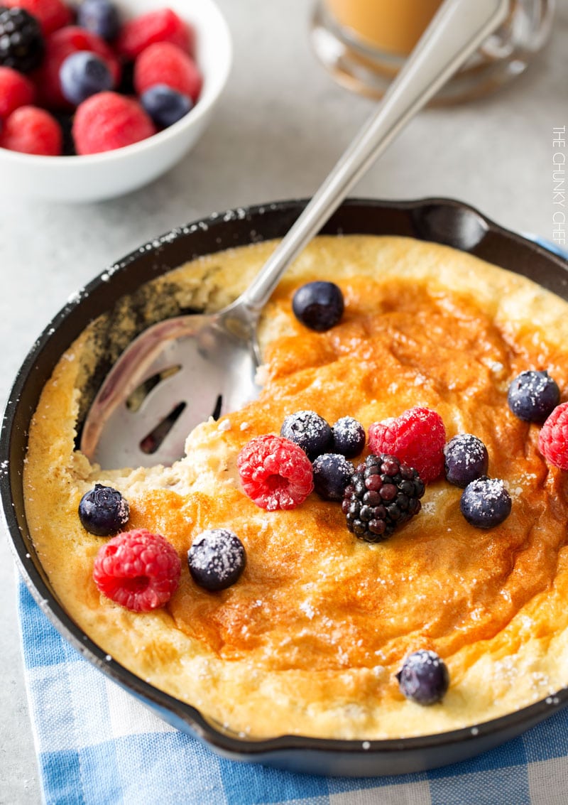 Mixed Berry Baked Oatmeal Souffle | Soft, fluffy oatmeal is folded with whipped egg whites and swirled with mixed berries, then baked until puffed and golden! | http://thechunkychef.com