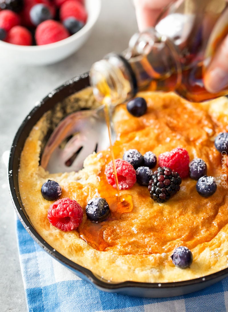 Mixed Berry Baked Oatmeal Souffle | Soft, fluffy oatmeal is folded with whipped egg whites and swirled with mixed berries, then baked until puffed and golden! | http://thechunkychef.com